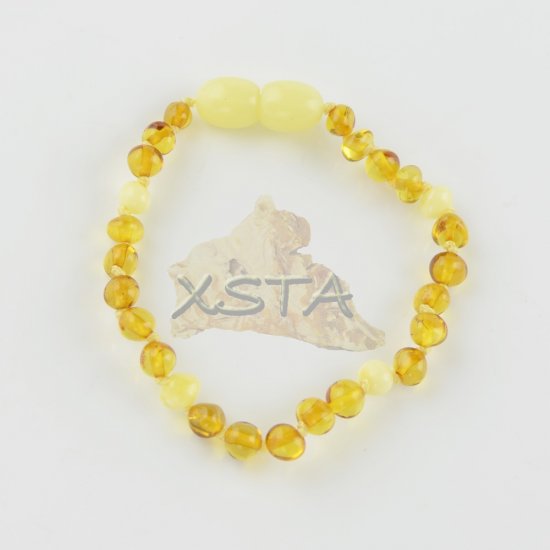 Amber baroque beads bracelet with white beads