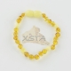 Amber baroque beads bracelet with white beads Amber baroque beads bracelet with white beads