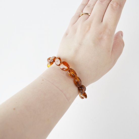 Polished natural amber bracelet olive cognac beads