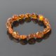 Polished natural amber bracelet olive cognac beads