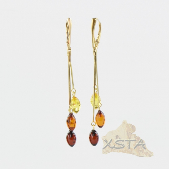 Amber earrings with silver-gold metal beads Amber earrings with silver-gold metal beads