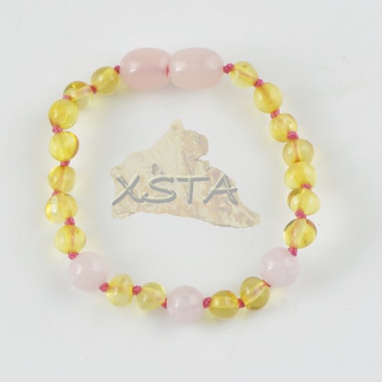 Teething amber bracelet with quartz pink color