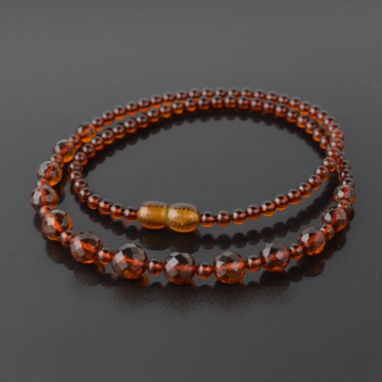 Amber necklace round faceted 4 to 8,5 mm
