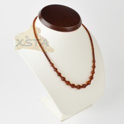 Amber necklace round faceted 4 to 8,5 mm