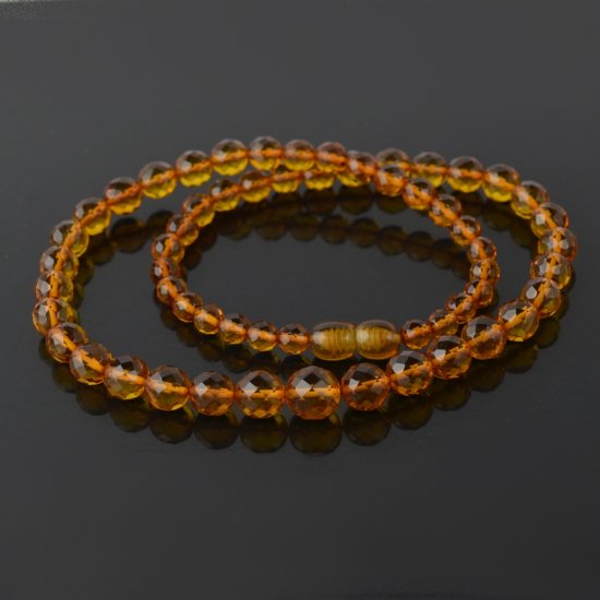 Amber necklace round faceted 5,5 to 9,5 mm