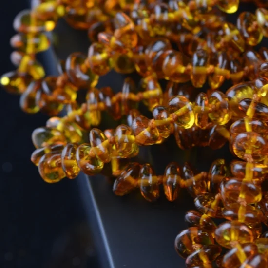 Cognac clat beads bracelet with knots and clasp