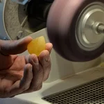 Raw amber nugget shaping into pendant