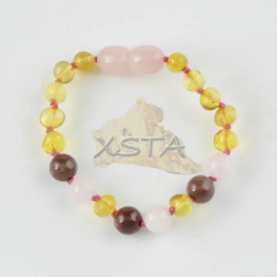 Teething amber bracelet with pink quartz jasper