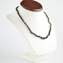 Baltic amber necklace with green color beads