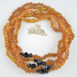 Raw baroque cognac beads with hexagon black bead Raw baroque cognac beads with hexagon black bead