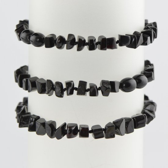 Polished black amber bracelet with screw clasp