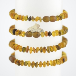 Raw green flat beads with knots and clasp Raw green flat beads with knots and clasp