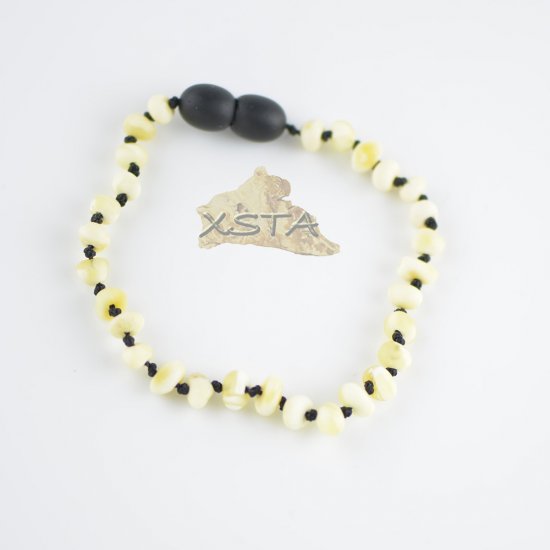 Raw white beads bracelet with black thread