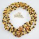 Raw multicolored necklace with cognac flower