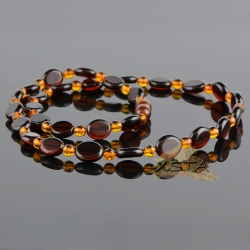 Calibrated flat olive and round beads necklace