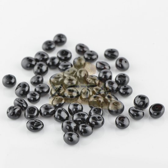 Polished black baroque amber beads 4-6 mm