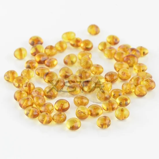 Polished cognac baroque amber beads 6-7 mm