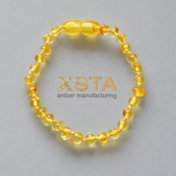 Amber teething bracelet baroque light honey polished