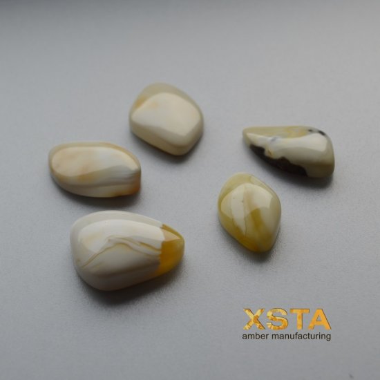 Package of amber cabochons