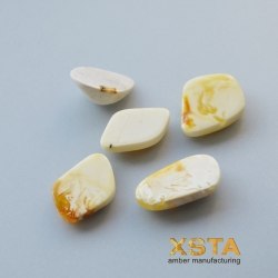 Cabochons from butter amber