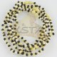Raw white black amber teething necklace