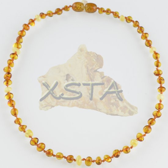 Teething amber necklace polished light cognac matt