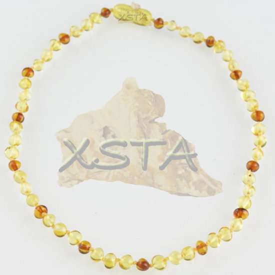 Teething baby necklace polished yellow light cognac